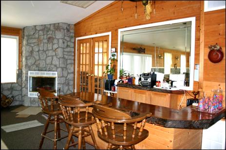 Rustic full service bar in the pool area.
Branson, Mo home with indoor pool